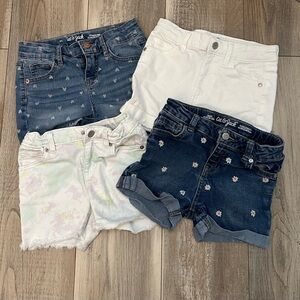 SET of 4 shorts. Girls size 7/8. Rarely worn. Excellent condition!